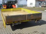 Sklápěcí přívěs na převoz stavební techniky