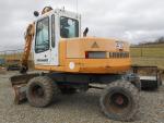 Prodám kolový bagr Liebherr 310