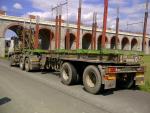 Lesovůz Volvo FM 12 - 6x6 + návěs Doll + Loglift 165 ZT