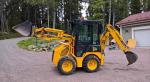 JCB 1CX traktorbagr smykem řízený nakladač
